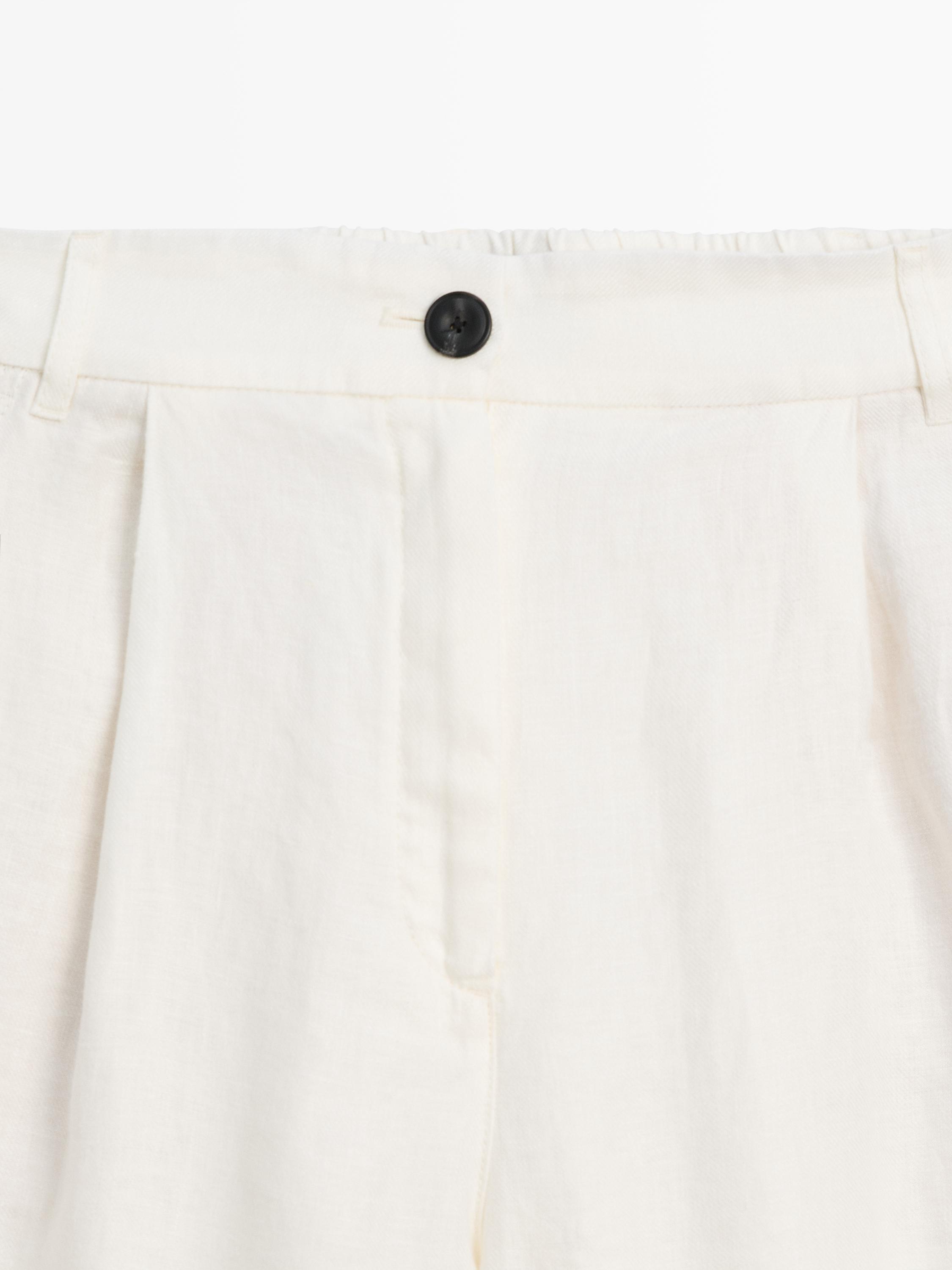 100% linen wide-leg elasticated trousers